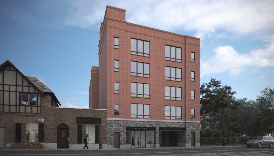 Elk Homes says it tops off rental building Colonial Court on Boulevard with final floor and roof