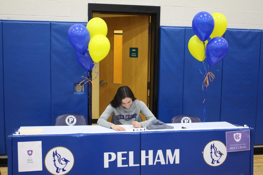 Maria Comerford signing letter of intent