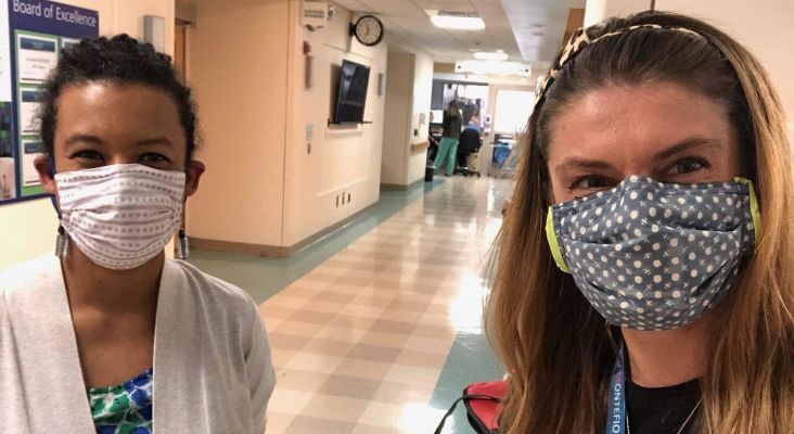 Health care workers wear masks made in Pelham.