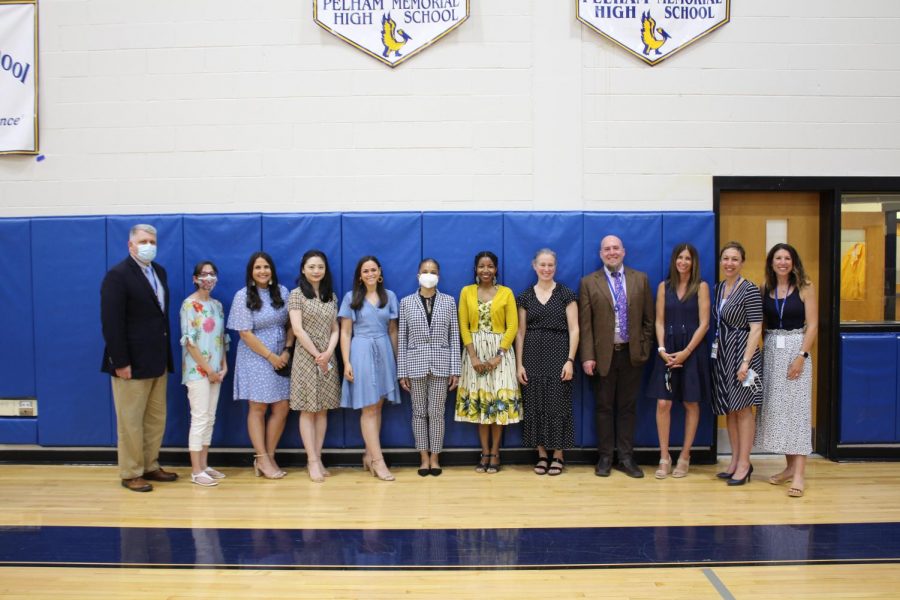 This years tenure recipients: Jim Hricay, Lisa DiCeglio, Paige Hefter, Yutong (Daisy) He, Samantha Horn, Linda Haynes, Leilani Ruprich, Fran Corelli, Sean Llewellyn and Jeannine Carr with Dr. Cheryl Champ, superintendent of schools, and Jessica DeDomenico, school board president.