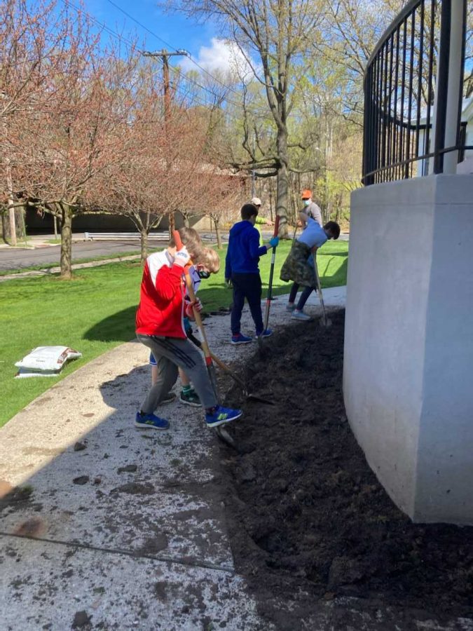 Volunteers worked on the sensory garden project led by Boy Scout Matthew Michailoff.