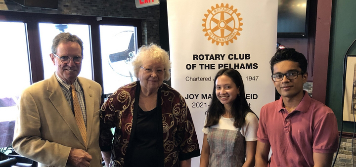 From left, Pelham Rotary Charities Fund Scholarship Chairman Kevin Falvey, Rotary member Maggie Klein, and scholarship winners Sophia Leung and Nevan Malwana.