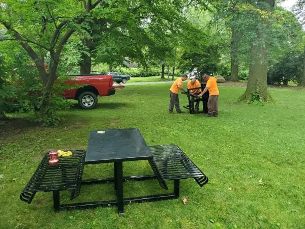 Employes of the Village of Pelham Manor Department of Public Works unloaded the second picnic table in Veterans Park.