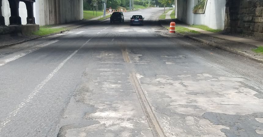 Snapshot: Tracks for trolley line that ran through town revealed by Pelhamdale Avenue repaving project