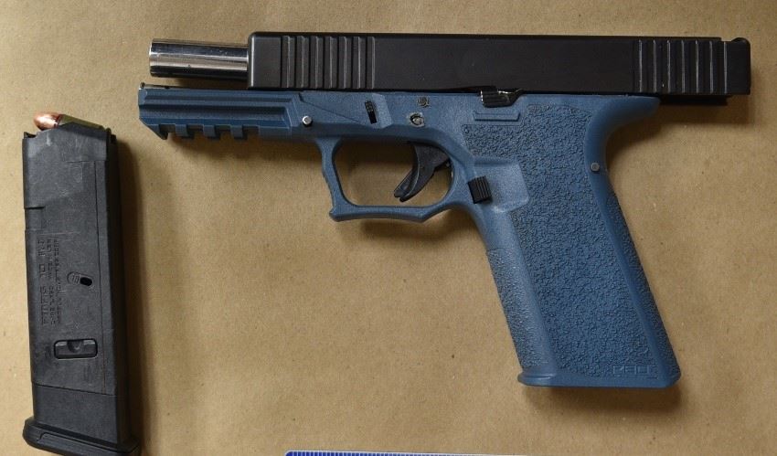 The weapon recovered from the alleged suspect in the murder. The pistol has no serial number and is considered a ghost gun, police said.
