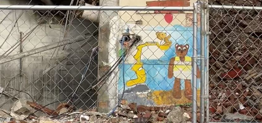 Snapshot: Hutch mural of excavator revealed by excavator wrecking Hutch