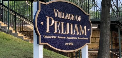 New Village of Pelham sign at train station: Get close to see details in background