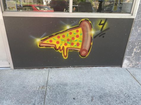 Four Corners takes inspiration from pizza graffiti left on storefront