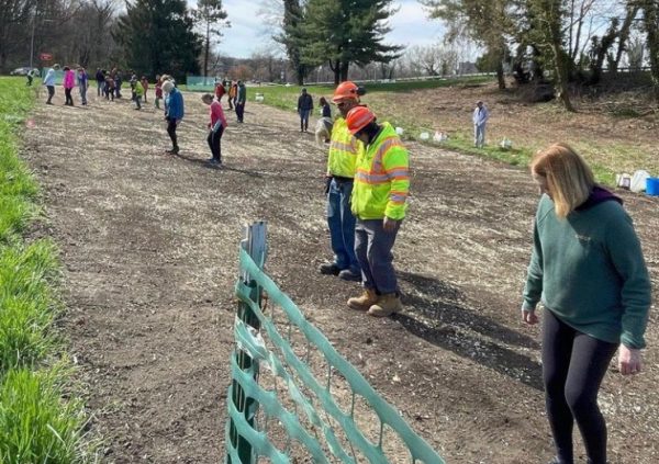 EcoPels team of 40 volunteers and state workers create pollinator meadow off exit 4 on Hutch