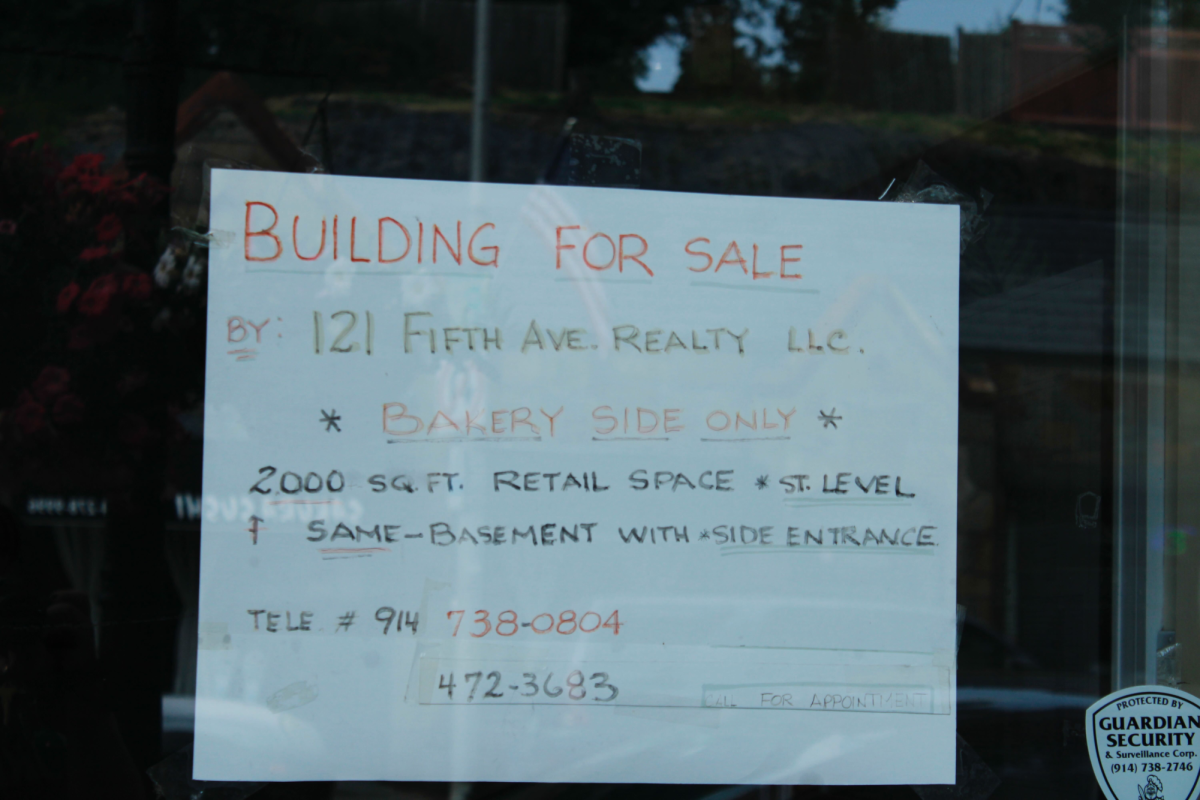 Building+for+sale+sign+posted+on+Pelham+Bakery+door.+