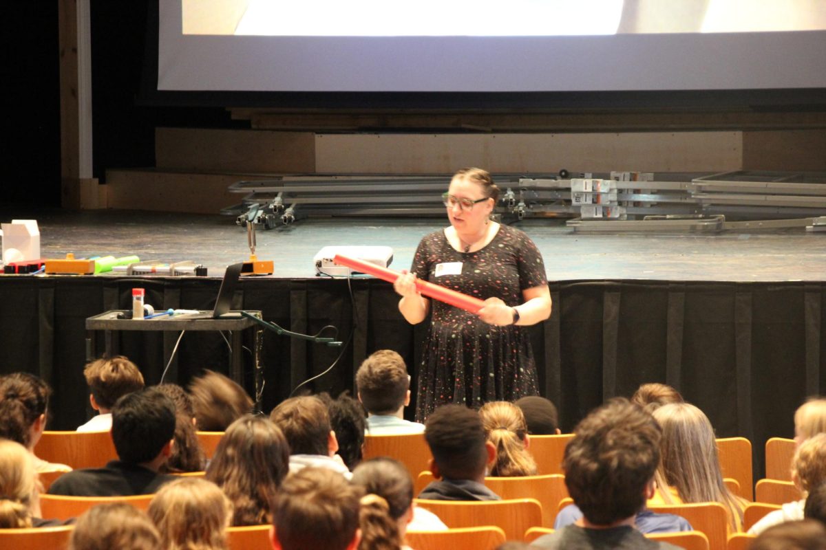 Pelham professor of acoustics brings the sound as sixth graders start science unit