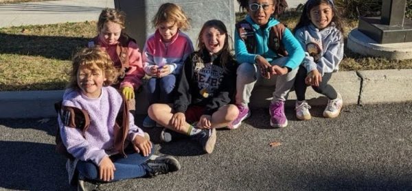 Foto Feature: PTAs unite kids and parents to clean up elementary schools after Halloween