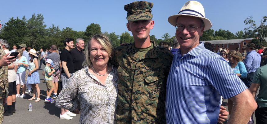 Dylan Gurl is flanked my his mother Anthea Perkinson and father Shaun Gurl after graduating from Marine Corps Officer Candidate School.