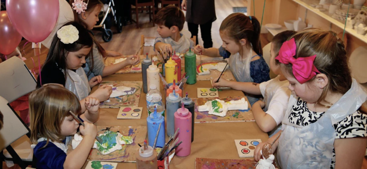 Kids attend a party at Plaster Palace Pottery.