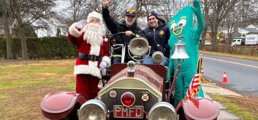 Manor Volunteer Fire Company on 2024 Santa and Gumby Run with its 1924 antique engine Saturday at Huguenot