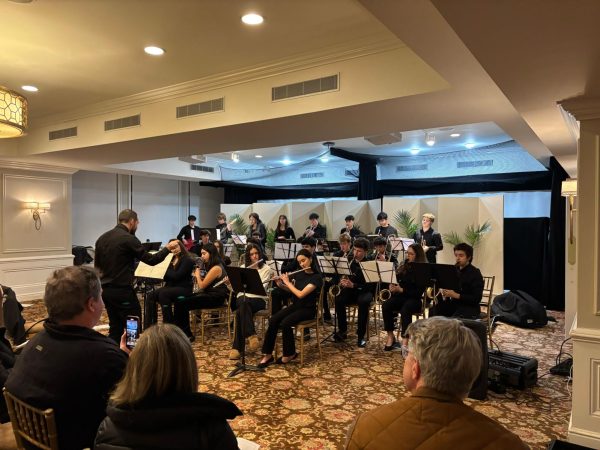 Pelham Memorial High School Band Director Andrew Van Bochove conducting the jazz band.