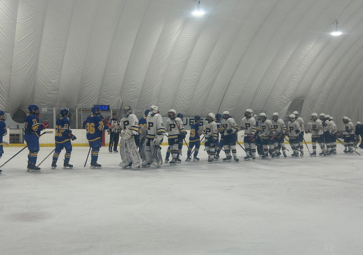 Pelham and Mahopac players shake hands after the semifinal.