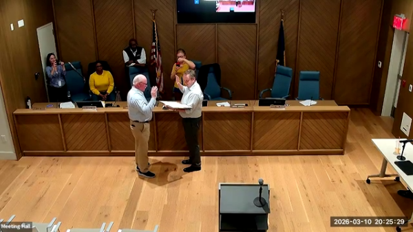 Kenneth Shirreffs being sworn in as the newest member of the village's planning board