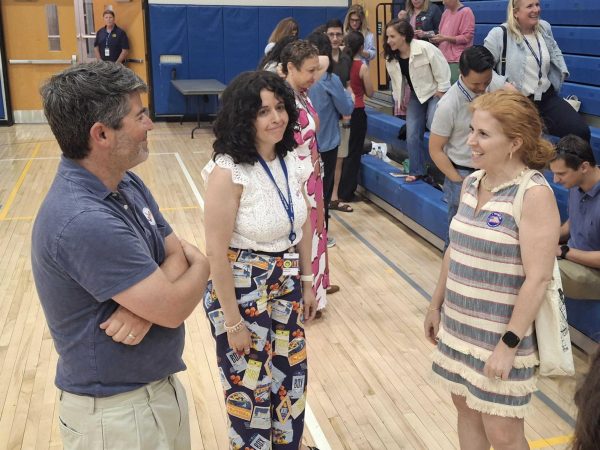 Sid Burke, Annemarie Garcia and Lisa Martino Alves at the Middle School gym after the results were announced