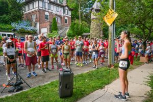 Grace Kiamie sings the national anthem before the race.